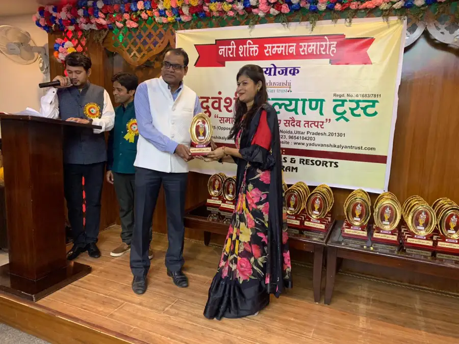 An award presented on stage at Naari Shakti