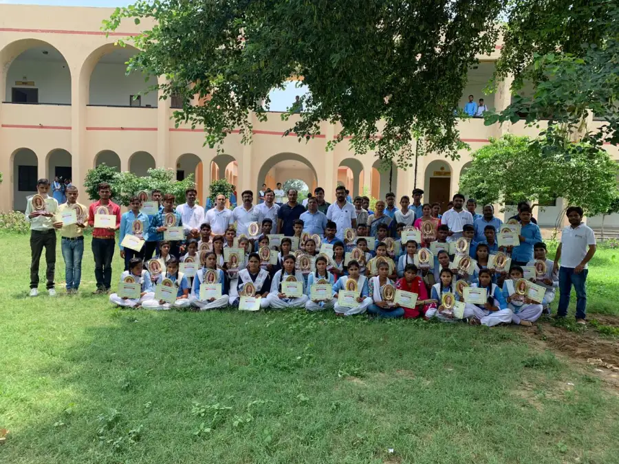 Students with certificates on the lawn of Government Inter College, Nasirpur