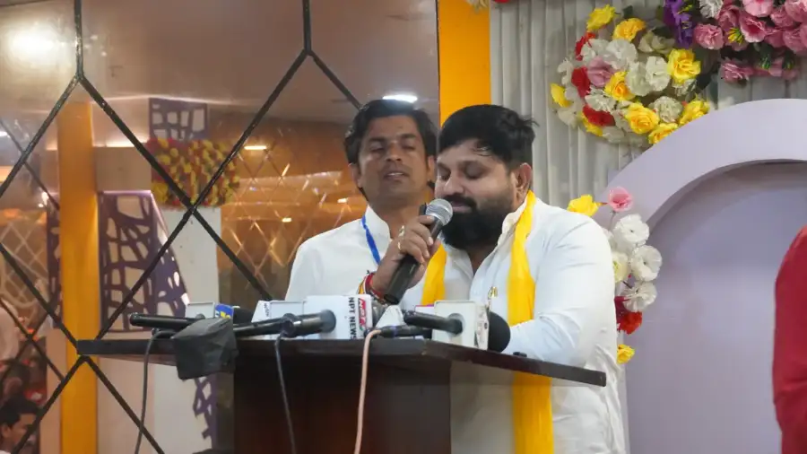 A member speaks at the Foundation Day ceremony