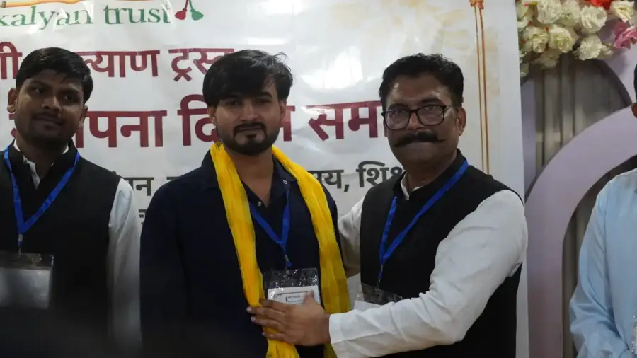 A young member is welcomed with a yellow stole