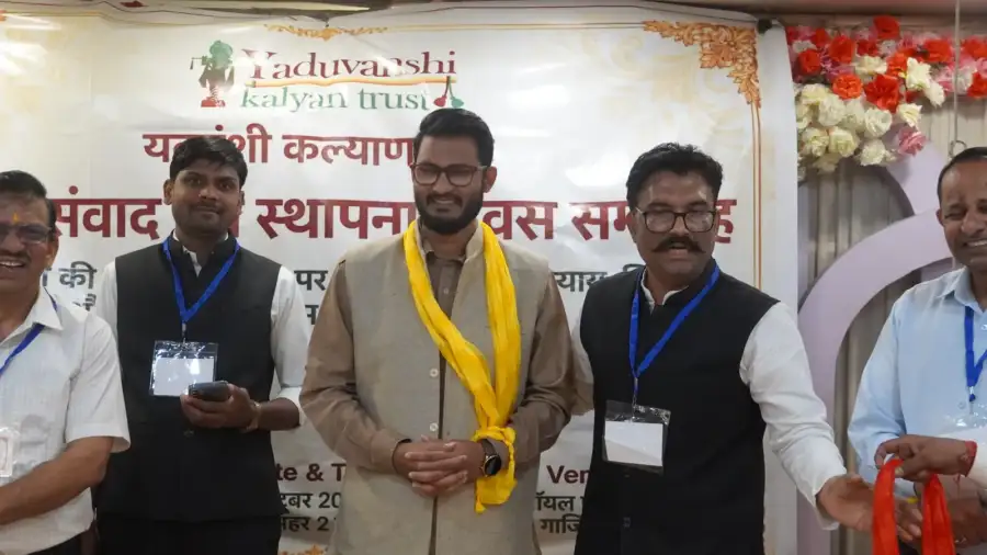 A member is welcomed on stage