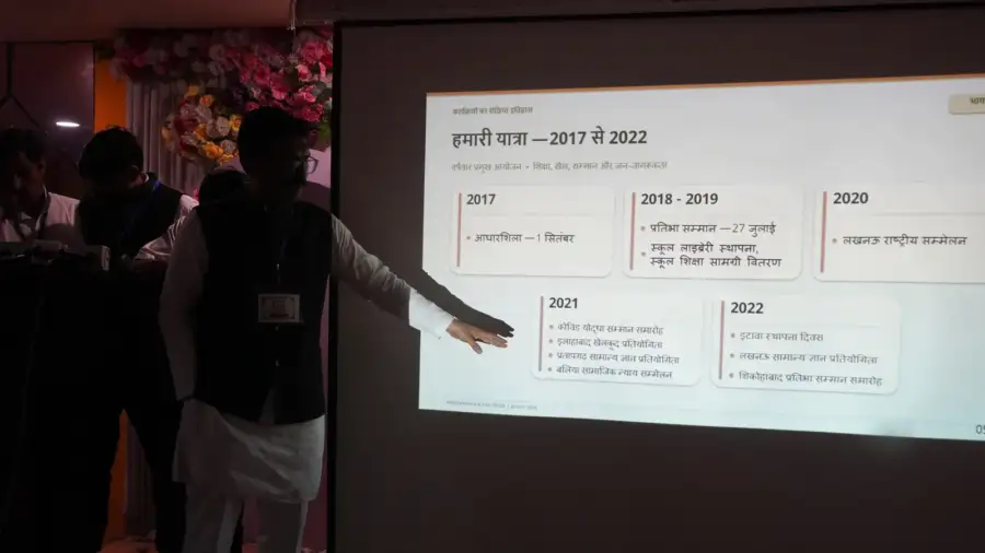 A slide on the Trust’s journey is explained to the hall